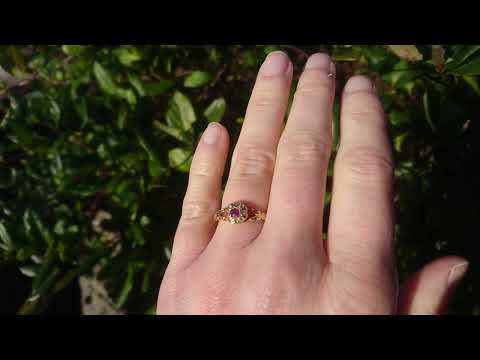 An antique ruby and diamond cluster ring