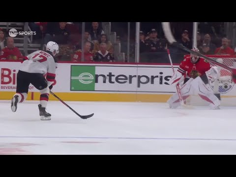 Simon Nemec scores a goal against the Chicago Blackhawks