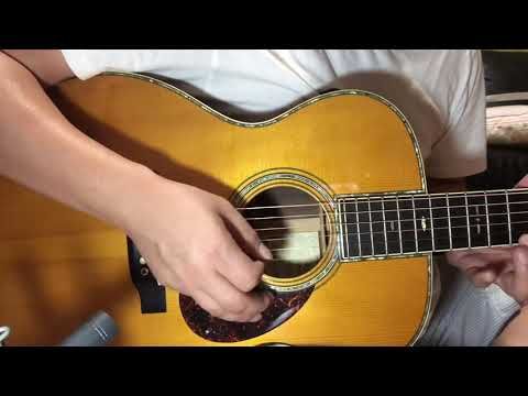 martin om-28 Jm  compare Martin om-45GE