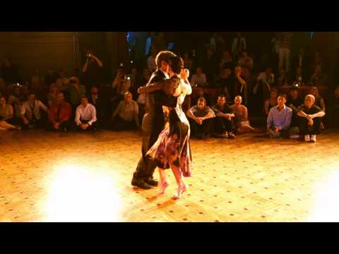  Alejandra Hobert  and  Adrian Veredice  are  dancing  to  the  milonga  "  Con Flauta y Guitarra  "  by  Héctor Varela  at  Brussels Tango Festival  in  2014