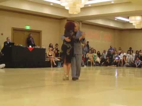  Enriqueta Kleinman  and  Osvaldo Natucci  are  dancing  to  the  tango  "  Tal Vez Sera Su Voz  "  by  Aníbal Troilo  in  2012