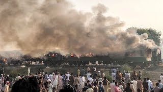 video: Fire engulfs Pakistan train killing at least 65