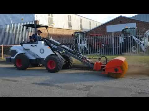CL50 Compact Loader with Sweeper Attachment