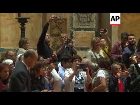 Petals drift down at Pantheon during Rome Mass
