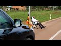 Museveni relaxing by the roadside of Entebbe Express Highway