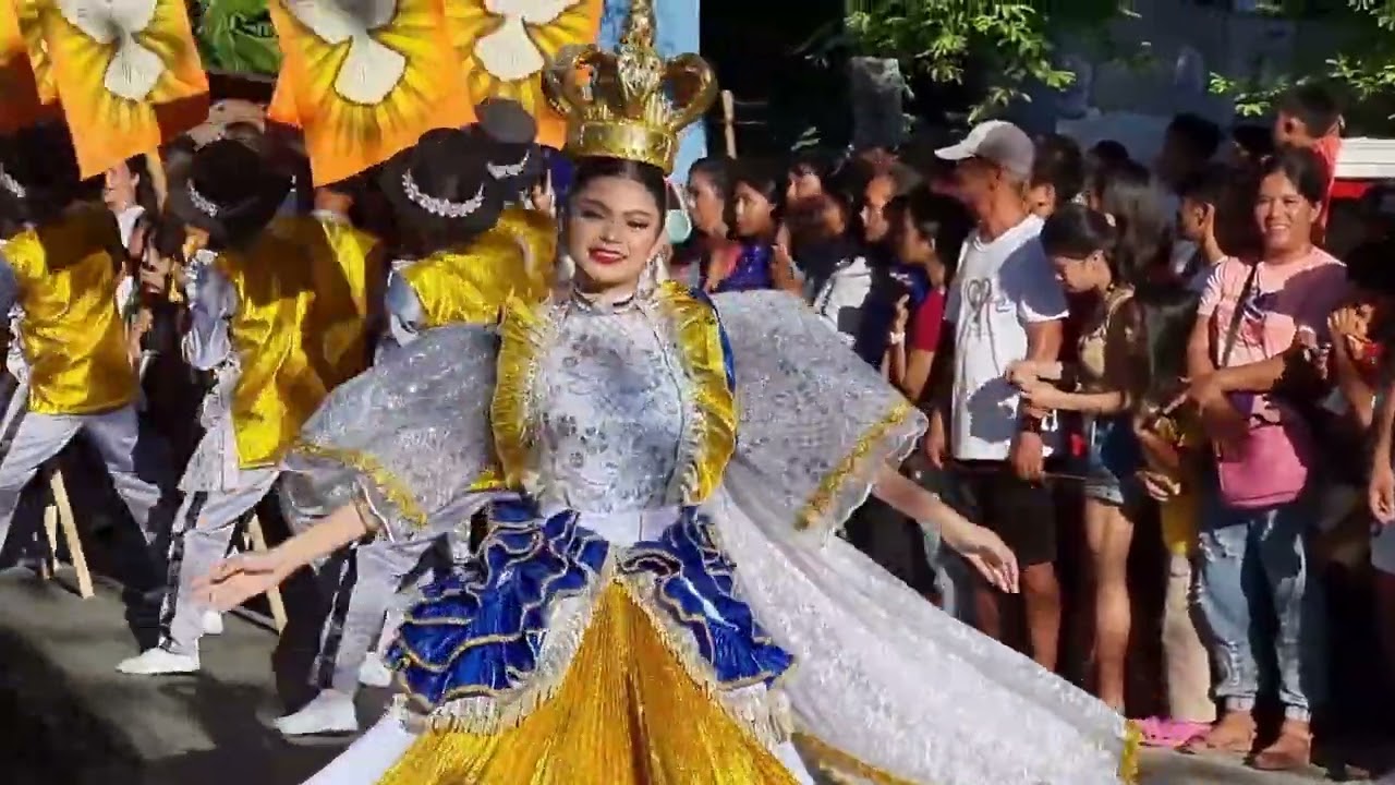 Costumes swirl, drums echo, and heritage dances through the streets of Oslob.
