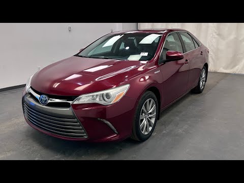 2017 Toyota Camry Hybrid in Red for sale at Davis GMC Buick Lethbridge in Lethbridge, AB