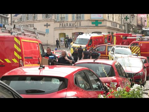 Rescuers search for trapped firefighters in northern France | AFP