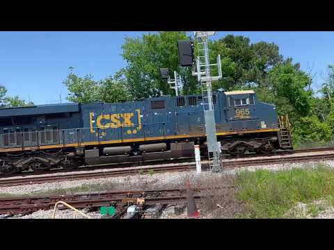 A Dash 8 Standard Cab With DPU Pusher Stops on the Main Line Before It Can Proceed Into the Yard