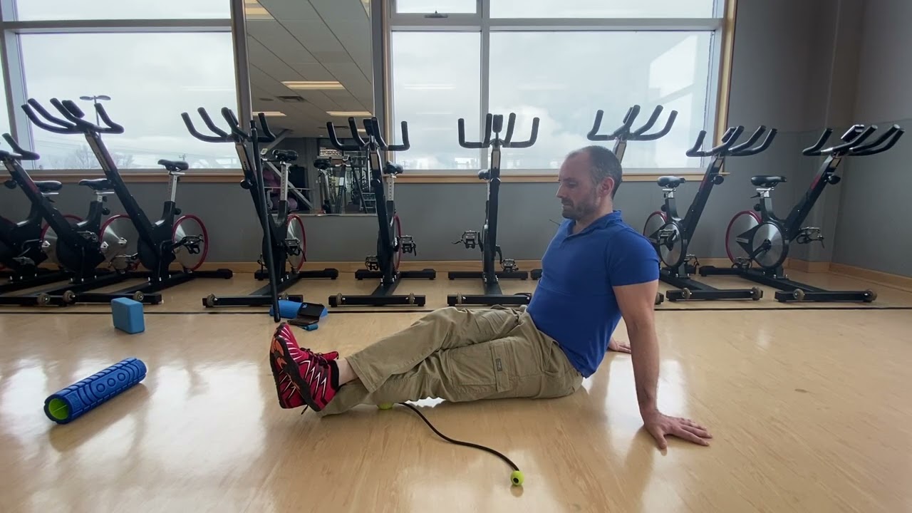 3. Calves + Massage Ball + Stacked Legs (Side View)