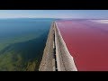 Splendid view: Train cuts through green and pink water