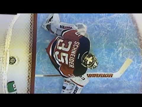 Corey Schneider's jersey makes a save - New Jersey Devils vs Detroit Red Wings 12/6/13