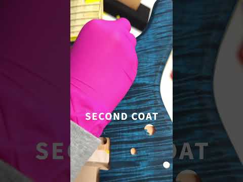 Watch our finishing department apply a special blue stain! #guitar