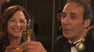 'Shape of Water' composer whistles theme at Oscar engraving