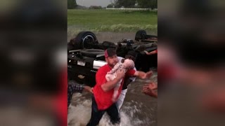 Strangers Save Father and 2 Babies Trapped Inside Overturned Truck During Floods