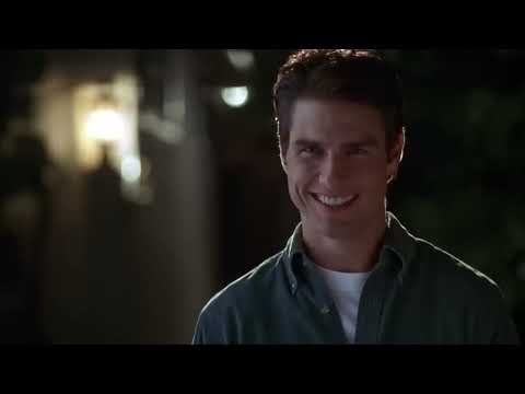Jerry Maguire official trailer still: Tom Cruise on a headset, hinting the film’s mix of hustle, romance, and radio-ready cues