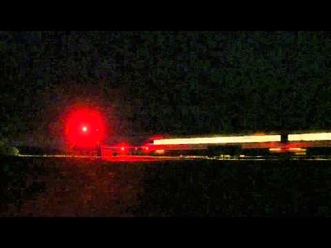 Level Crossing at Night - Vline Vlocity Passenger Train at a Railroad Crossing - PoathTV