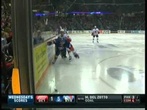 Andrew MacDonald hipchecks Jonathan Rheault