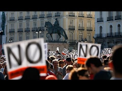 Spain's Indignados movement holds anniversary march