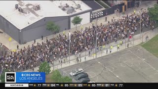 Thousands of striking actors, writers join in massive Hollywood solidarity march