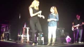 Little Girl (Genesis K. Nava) sings for Carrie Underwood and takes over the stage.