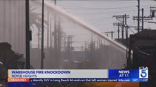 Boyle Heights warehouse fire knocked down, L.A. fire officials announce