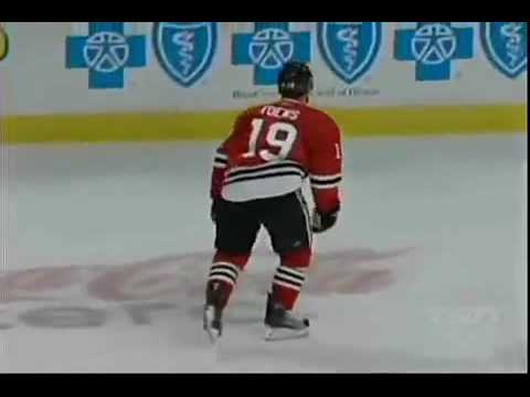Willie Mitchell destroys Jonathan Toews