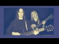 "Am I Still Your Demon", written by Liz Tormes and performed by The Nine Seas