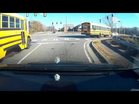 F150 illegally passes car in turn lane