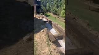 Proper way to install railroad tie, retaining wall. ￼