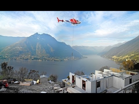 Wolf Haus costruisce una casa utilizzando l'elicottero