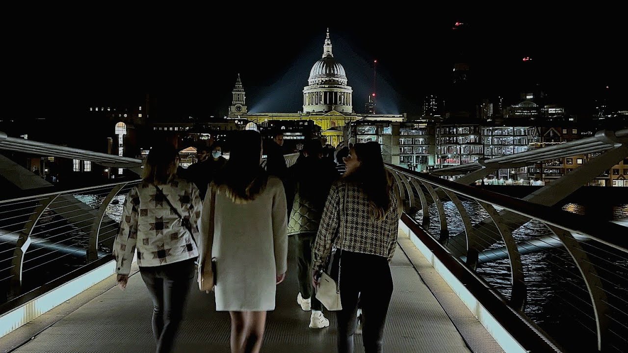 Embark on a nocturnal stroll across the Millennium Bridge.