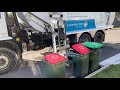 Overflowing Broken Red Bins Vs Garbage Truck