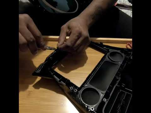 Carbon fiber wrap interior radio panel.