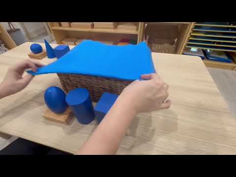 Montessori Sensorial Lesson: Introduction to Geometric Solids | AMI Approach