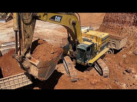Caterpillar 365C Excavator Loading Mercedes & MAN Trucks