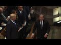 George W Bush Sneaks Candy To Michelle Obama At Bush Funeral