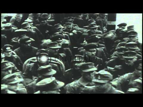 Missiles are launched and soldiers fire artillery on a battlefield in the Europea...HD Stock Footage