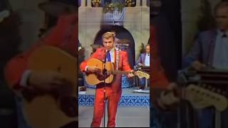(Buck Owens and the Buckaroos doing You Gotta Have a License