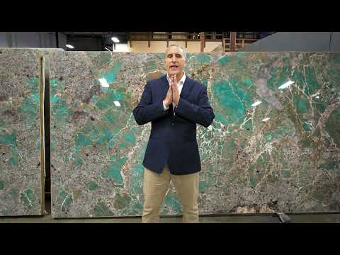Part of a video titled Amazonite Granite Slabs: Ultimate Guide to The Rare Green Gemstone