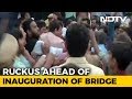 Was Pushed Says BJP S Manoj Tiwari Seen Punching Cops At Bridge Opening