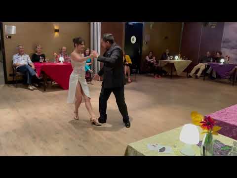  Octavio Fernandez  and  Vanessa Fatauros  are  dancing  to  the  tango  "  El Puntazo  "  by  Juan D'Arienzo  in  2022