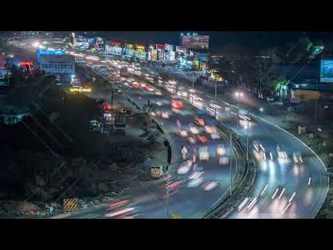Aerial Long Exposure night traffic time lapse on Mumbai Pune Highway Pune, Maharashtra, India