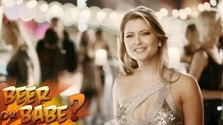 Beer or Babe? Stunning Holly Valance rocks cocktail party