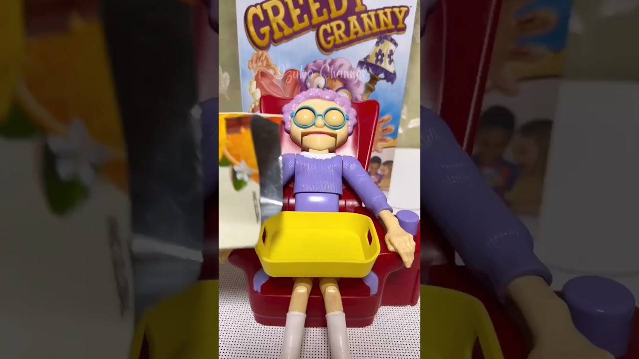 Granny's snacks🍊🍫 #shorts #greedygrannygoliath #asmrsounds #trending #chocolate #orange #toy