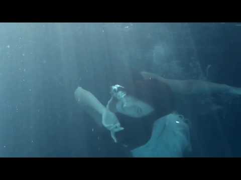 Underwater ballet dancers from  underwater photographer with sony alpha camera. real mermaids