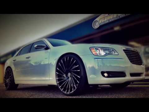 2014 Chrysler 300C Sitting On Custom 24\" Lexani Wraith wheels and 255/30-24 Pirelli tires.