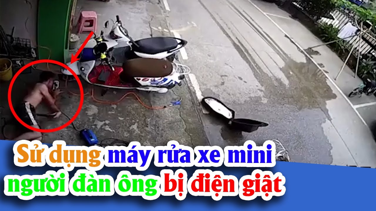 Sử dụng máy rửa xe người đàn ông bị giật và khoảnh khắc vật lộn để tự cứu mình 4
