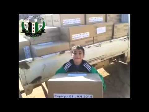 توزيع المعونات الإغاثية في ريف درعا الشرقي في محافظة درعا من قبل لواء توحيد كتائب حوران