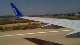 preview picture of video 'FlyDubai Landing and Taxi at Alexandria intl with B737-800NG (Wing View)'